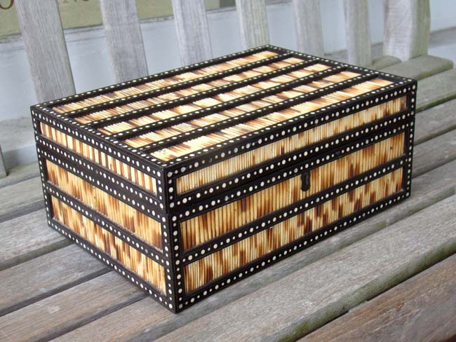 A fine 19th century Porcupine quill, ebony and inlaid ivory trinket or jewelery box